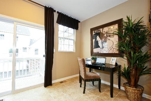 10346 Kerry Ridge Court, Unit 26 Chicago Ridge, IL 60415 - Photo 12 of 13 a view of a workspace with furniture and a window