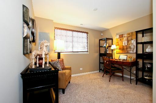 10346 Kerry Ridge Court, Unit 26 Chicago Ridge, IL 60415 - Photo 10 of 13 a living room with furniture a piano and a window