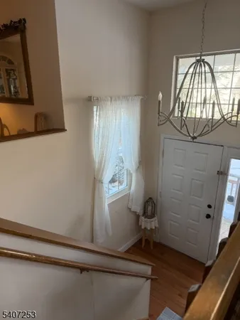 a bedroom with a bed and dresser