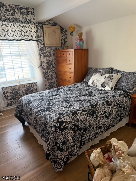 15 Rhea Run, Unit 15 Newton, NJ 07860 - Photo 19 of 19 a bed sitting in a bedroom next to a window