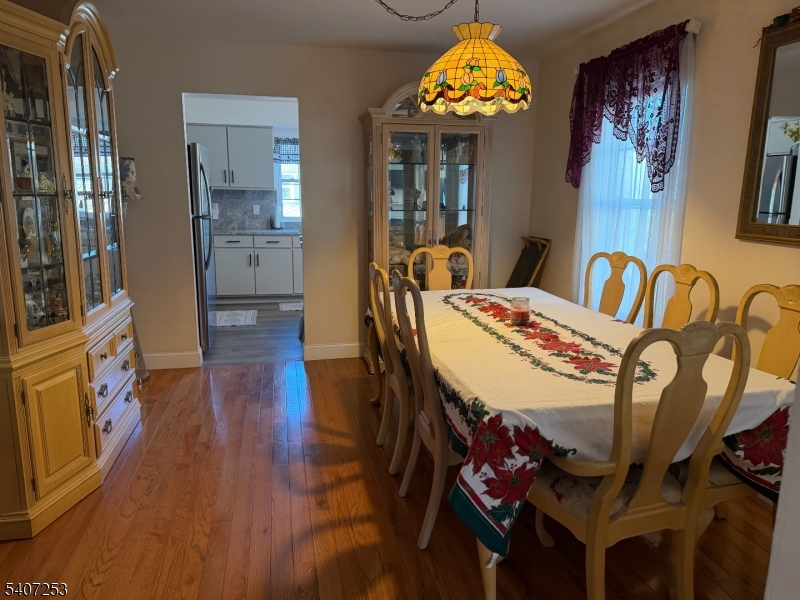 15 Rhea Run, Unit 15 Newton, NJ 07860 - Photo 7 of 19 a view of a dining room with furniture and wooden floor