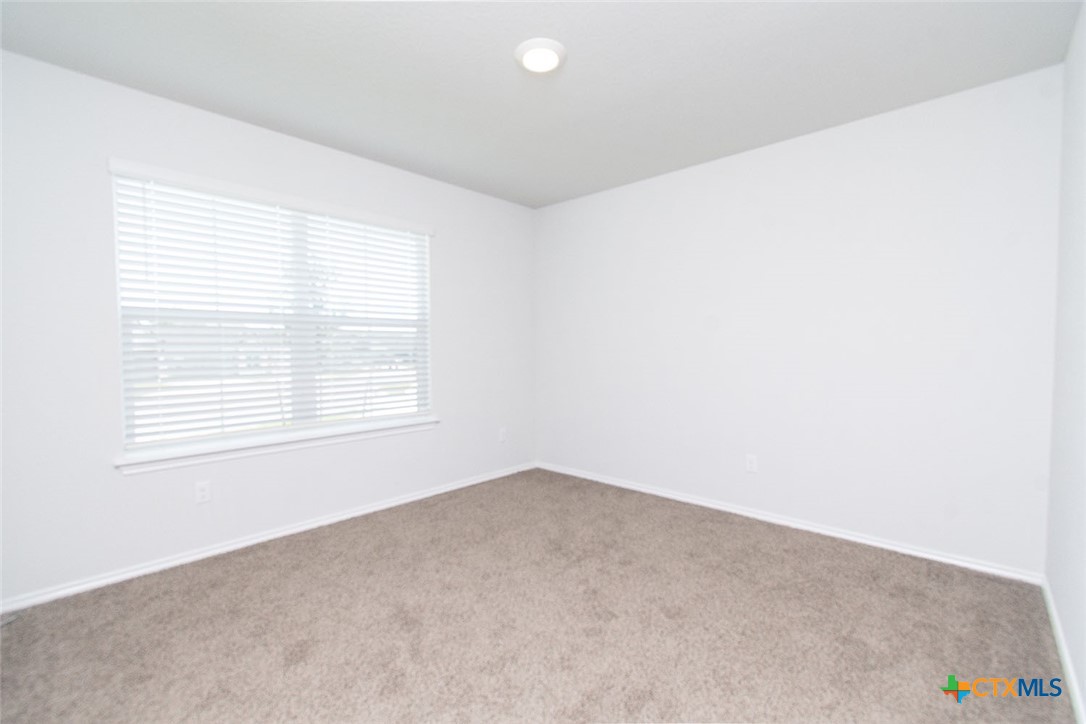 1717 Cedrus Drive Belton, TX 76513 - Photo 22 of 23 an empty room with a window