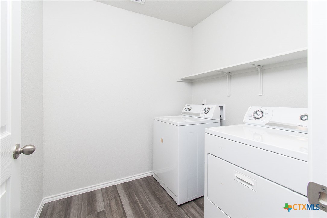 1717 Cedrus Drive Belton, TX 76513 - Photo 8 of 23 a utility room with dryer and washer