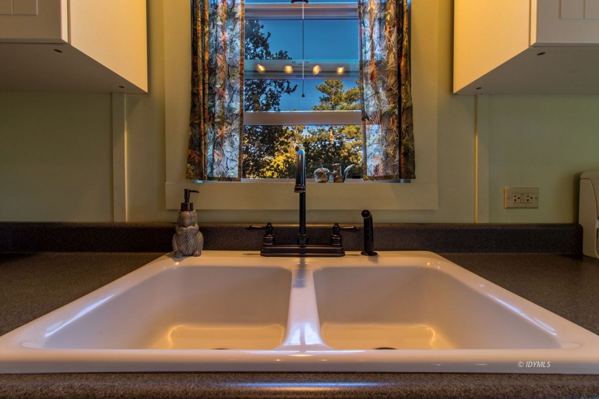 52830 Cedar Crest Drive Pine Cove, CA 92549 - Photo 13 of 31 a bathroom with a sink and a mirror