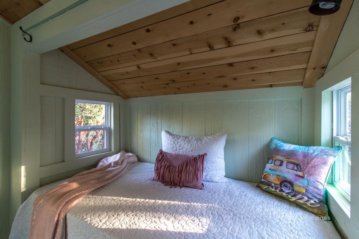 52830 Cedar Crest Drive Pine Cove, CA 92549 - Photo 29 of 31 a bed sitting in a bedroom next to a window