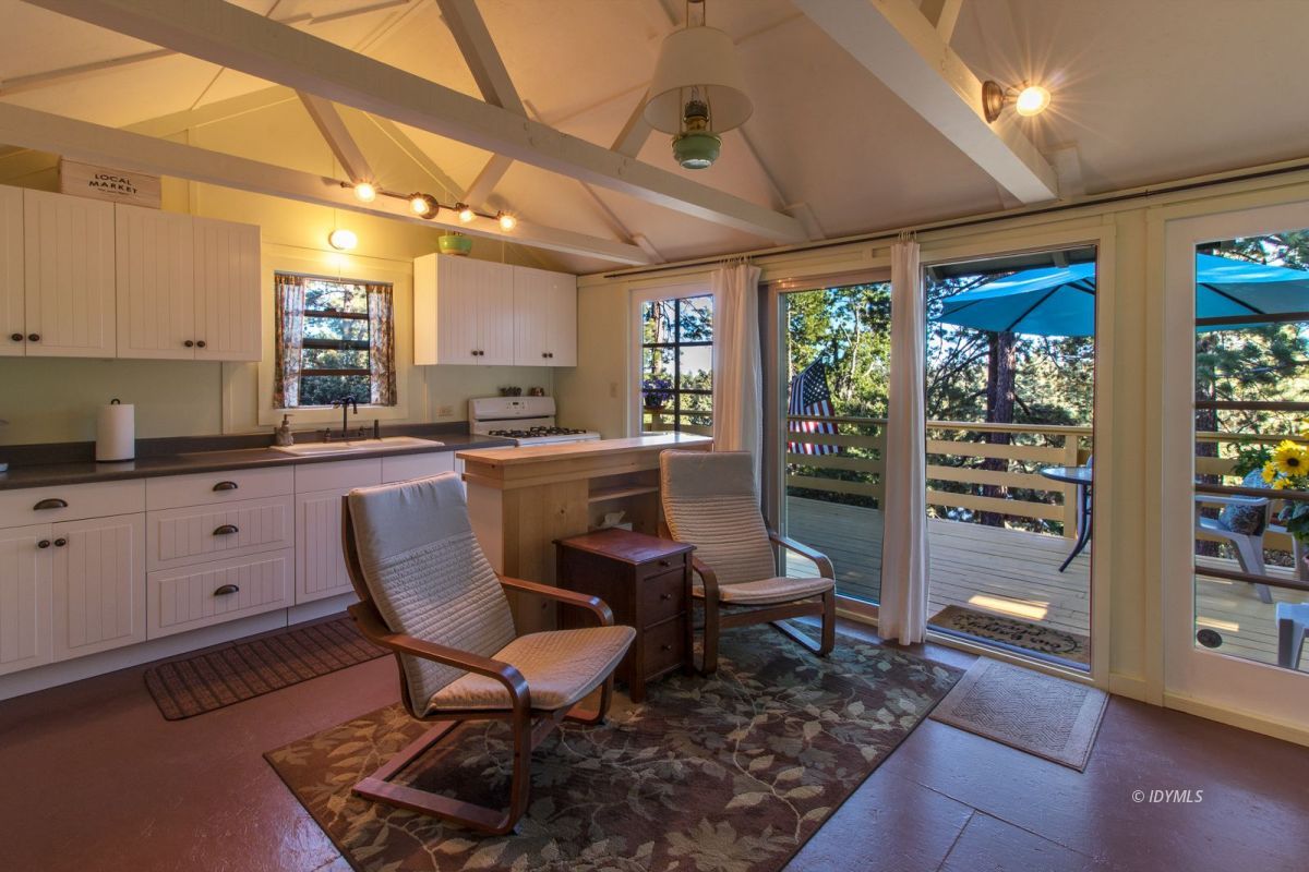 52830 Cedar Crest Drive Pine Cove, CA 92549 - Photo 9 of 31 a view of a dining room with furniture window and outside view