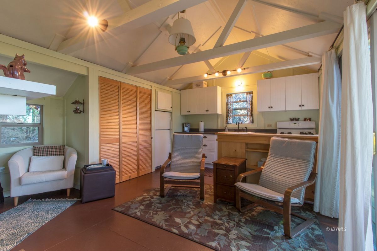 52830 Cedar Crest Drive Pine Cove, CA 92549 - Photo 10 of 31 a living room with furniture and a chandelier