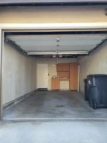 a swimming pool with outdoor seating and yard