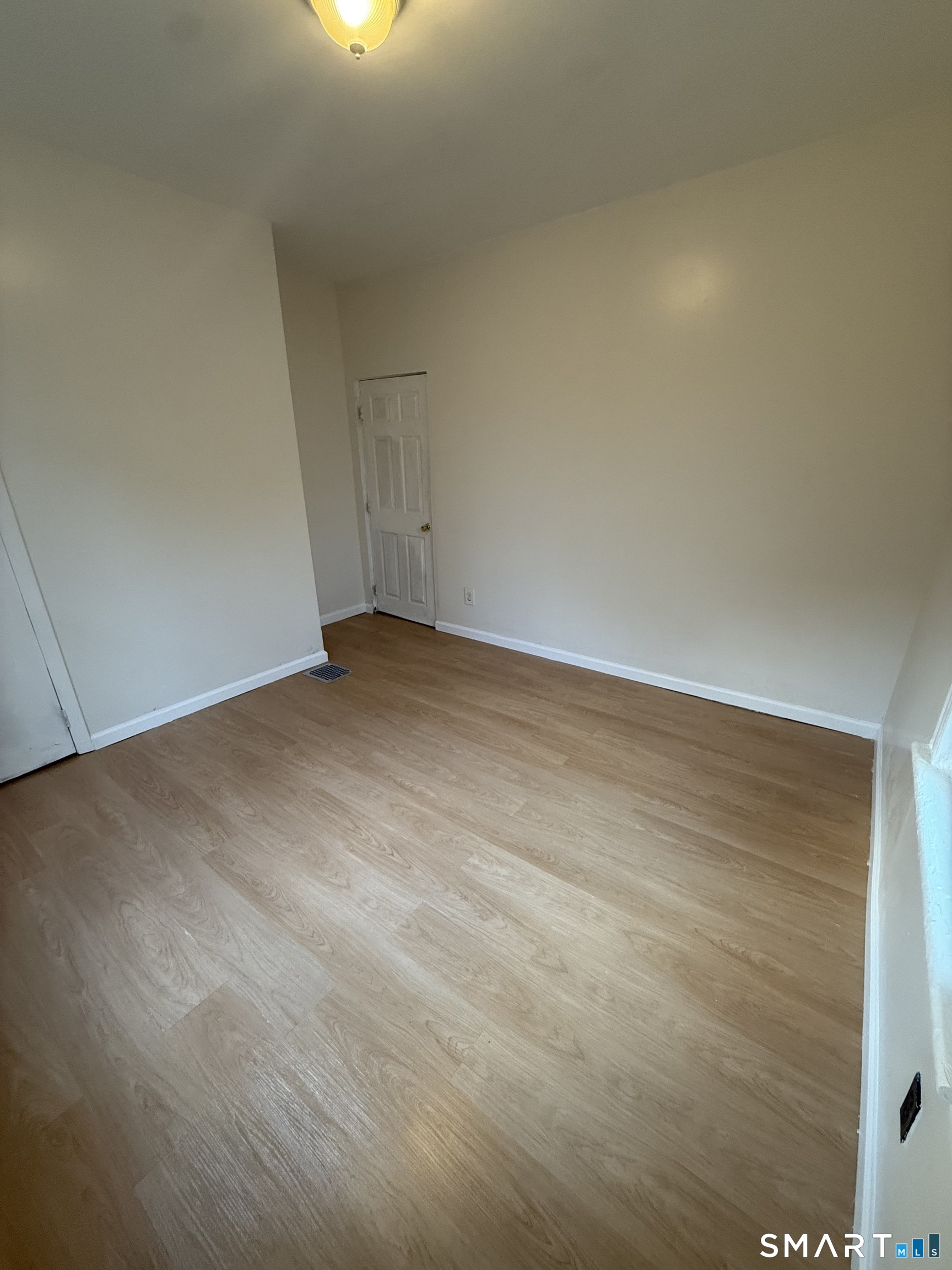 180 5th Street, Unit 1 Bridgeport, CT 06607 - Photo 11 of 26 a view of an empty room