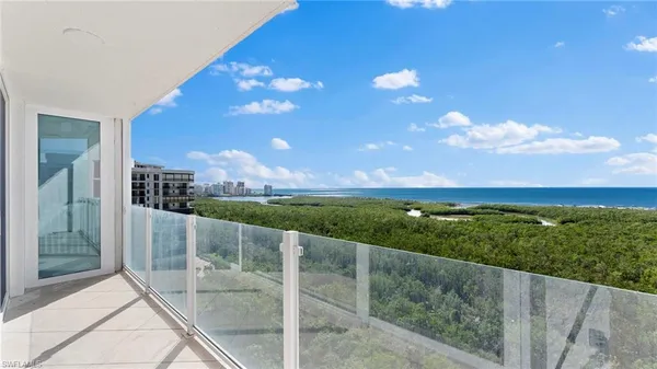 a view of a balcony with an outdoor space