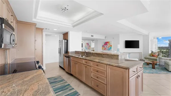 a spacious bathroom with a sink double vanity and a mirror