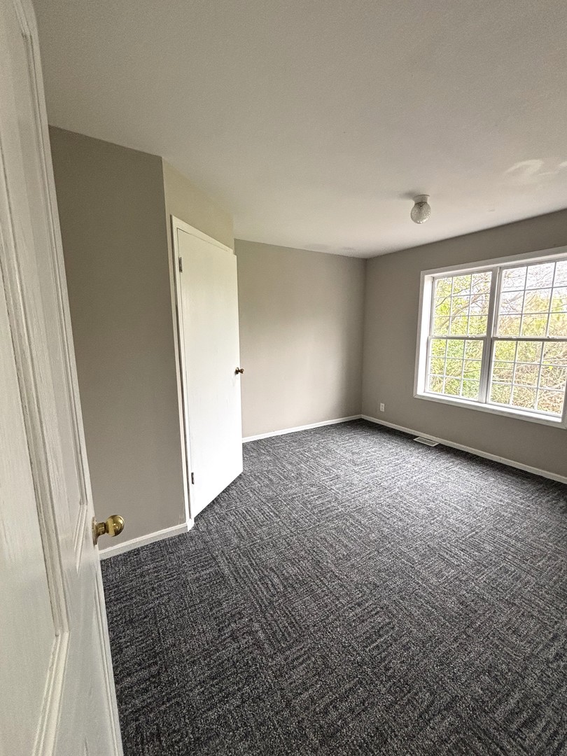 37150 South Macks Road Wilmington, IL 60481 - Photo 11 of 20 an empty room with windows