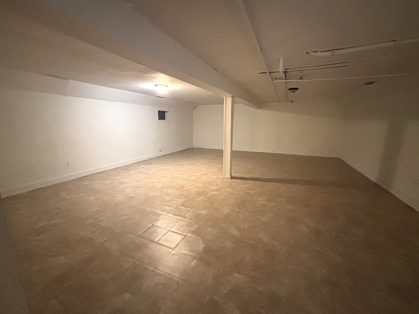 37150 South Macks Road Wilmington, IL 60481 - Photo 13 of 20 an empty room with a ceiling fan and window