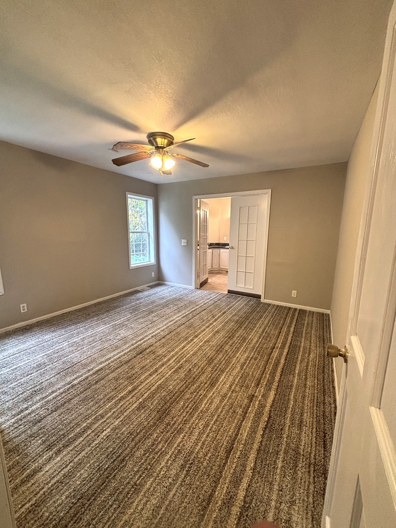 37150 South Macks Road Wilmington, IL 60481 - Photo 7 of 20 wooden floor in an empty room with a window