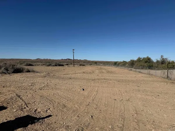 a view of beach and mountain