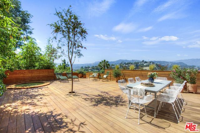 a view of a patio with swimming pool