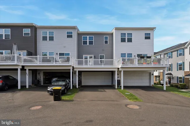 a view of car parked in front of building