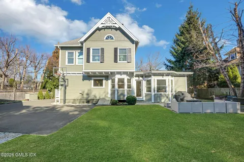 a garden view with a seating space