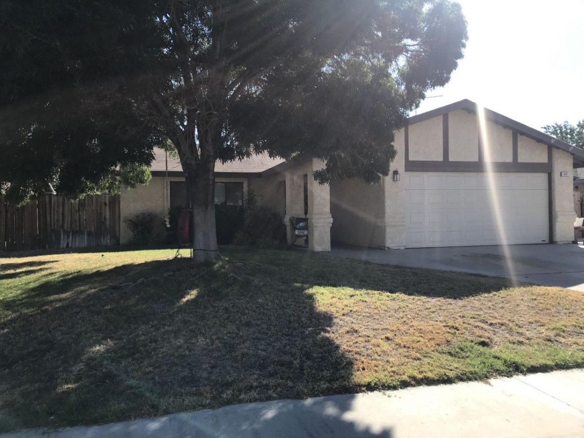 212 Chambers Street Ridgecrest, CA 93555 - Photo 1 of 1 a view of a house with a yard