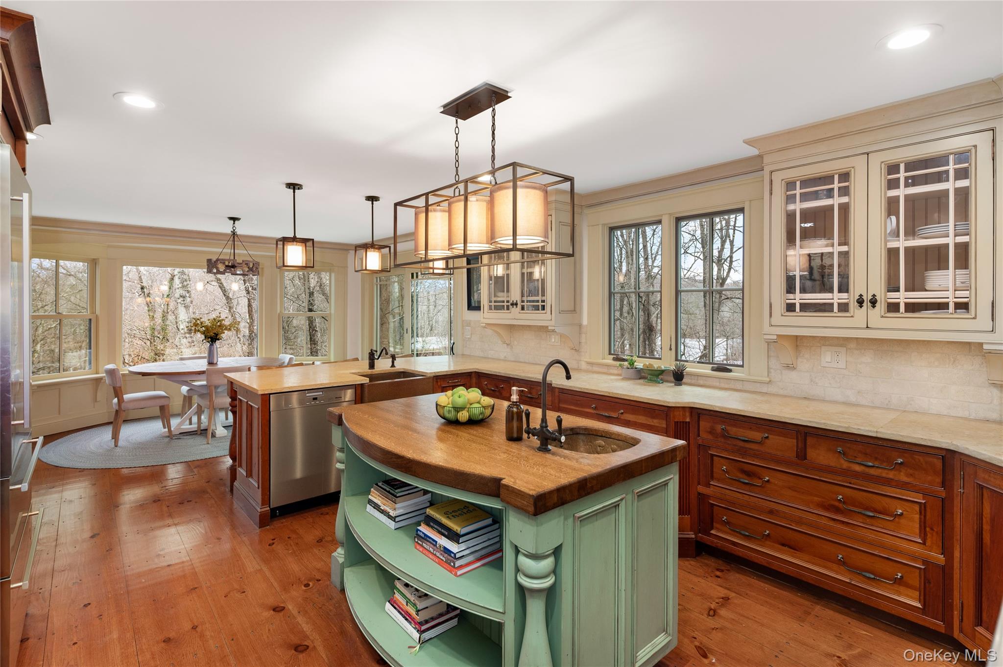1355 Journeys End Road Croton-on-Hudson, NY 10520 - Photo 13 of 47 a kitchen that has a sink a stove and a table in it