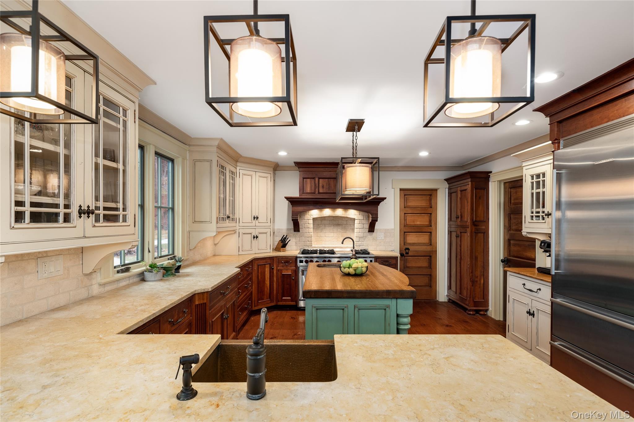 1355 Journeys End Road Croton-on-Hudson, NY 10520 - Photo 16 of 47 a kitchen with sink refrigerator and stove