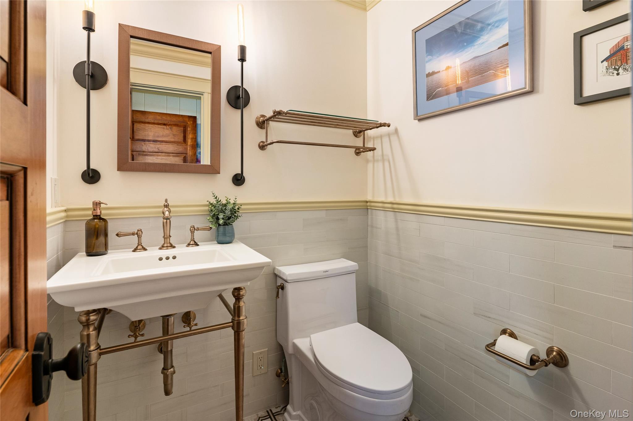 1355 Journeys End Road Croton-on-Hudson, NY 10520 - Photo 33 of 47 a bathroom with a toilet sink and mirror