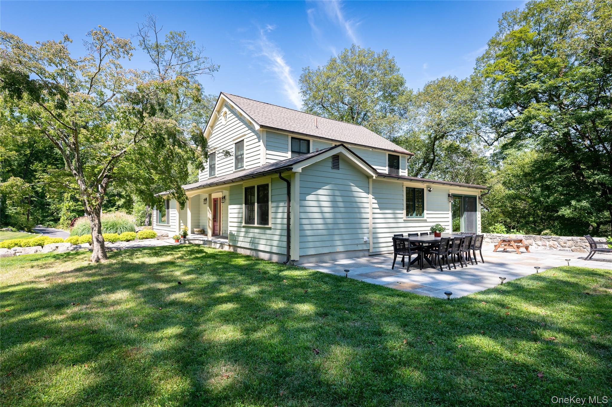 1355 Journeys End Road Croton-on-Hudson, NY 10520 - Photo 35 of 47 a view of backyard of house with outdoor seating and green space
