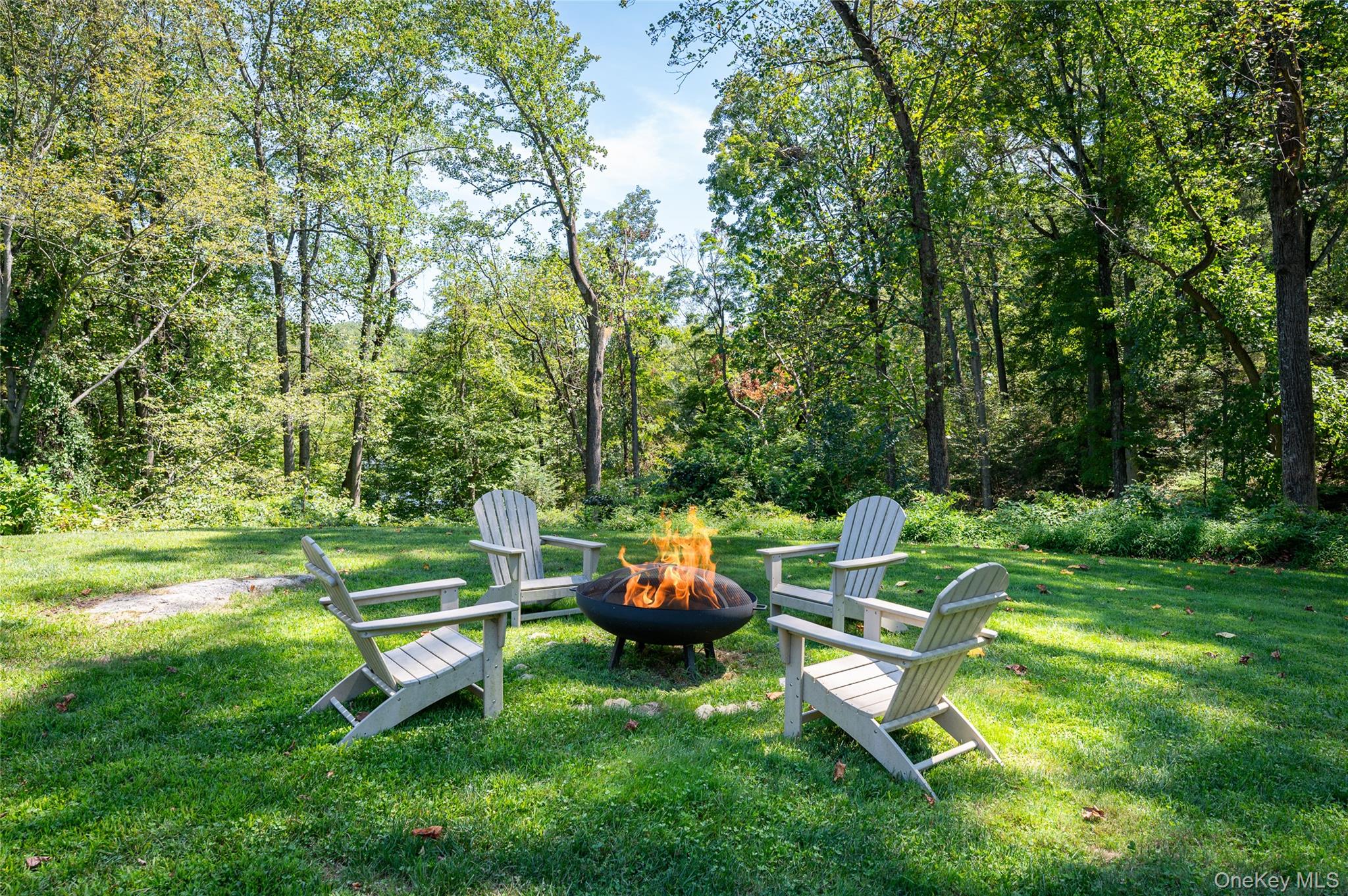 1355 Journeys End Road Croton-on-Hudson, NY 10520 - Photo 40 of 47 a garden view with a sitting space
