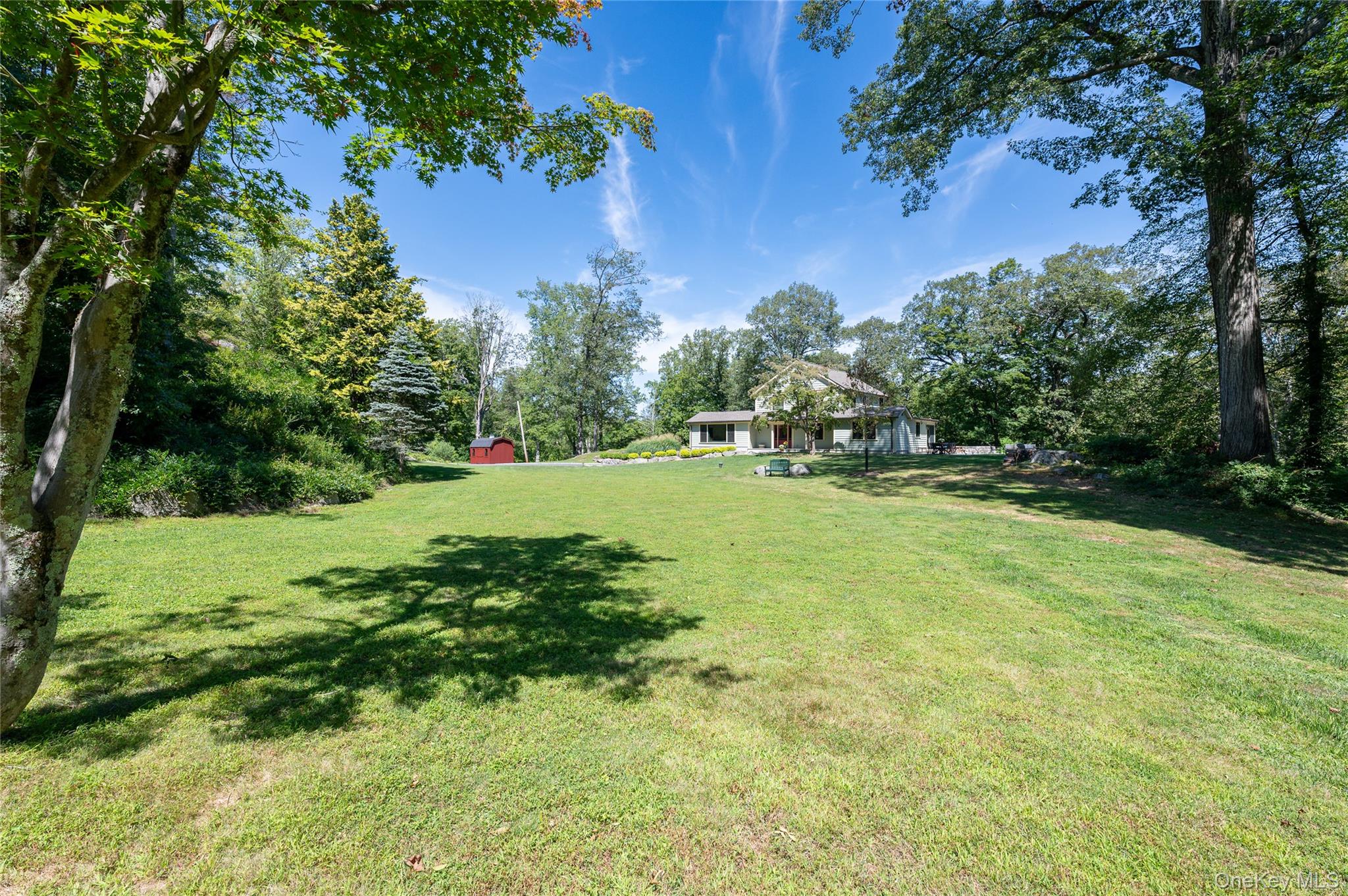 1355 Journeys End Road Croton-on-Hudson, NY 10520 - Photo 42 of 47 a view of green field with trees in the background