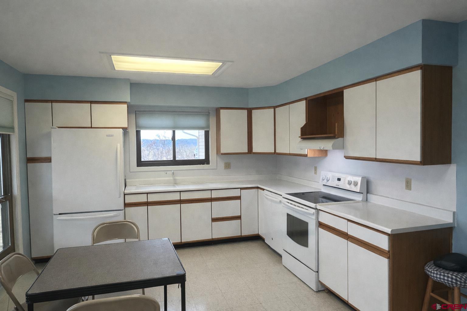 19825 Rd P Cortez, CO 81321 - Photo 4 of 38 a kitchen with a sink cabinets and window