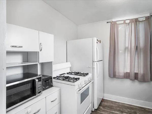 a view of a livingroom with a staircase