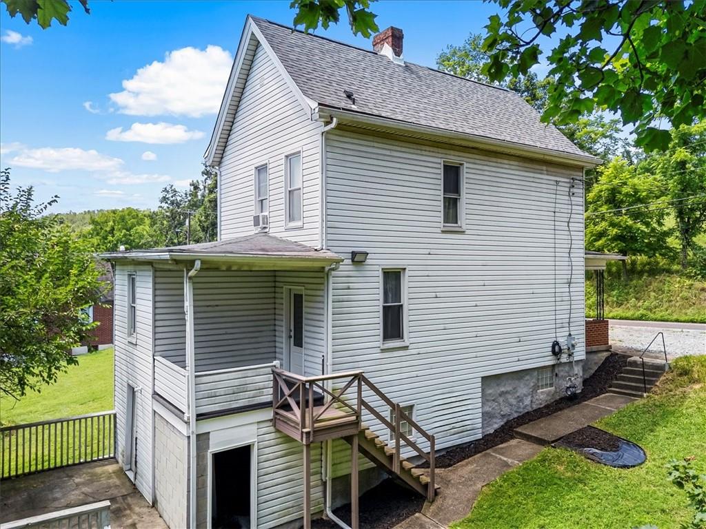 198 Penn Adamsburg Road Penn, PA 15675 - Photo 21 of 27 a side view of a house with a yard