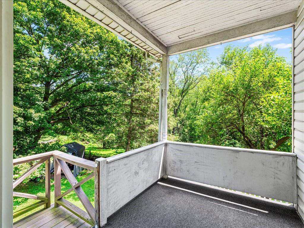 198 Penn Adamsburg Road Penn, PA 15675 - Photo 24 of 27 a view of a balcony with trees
