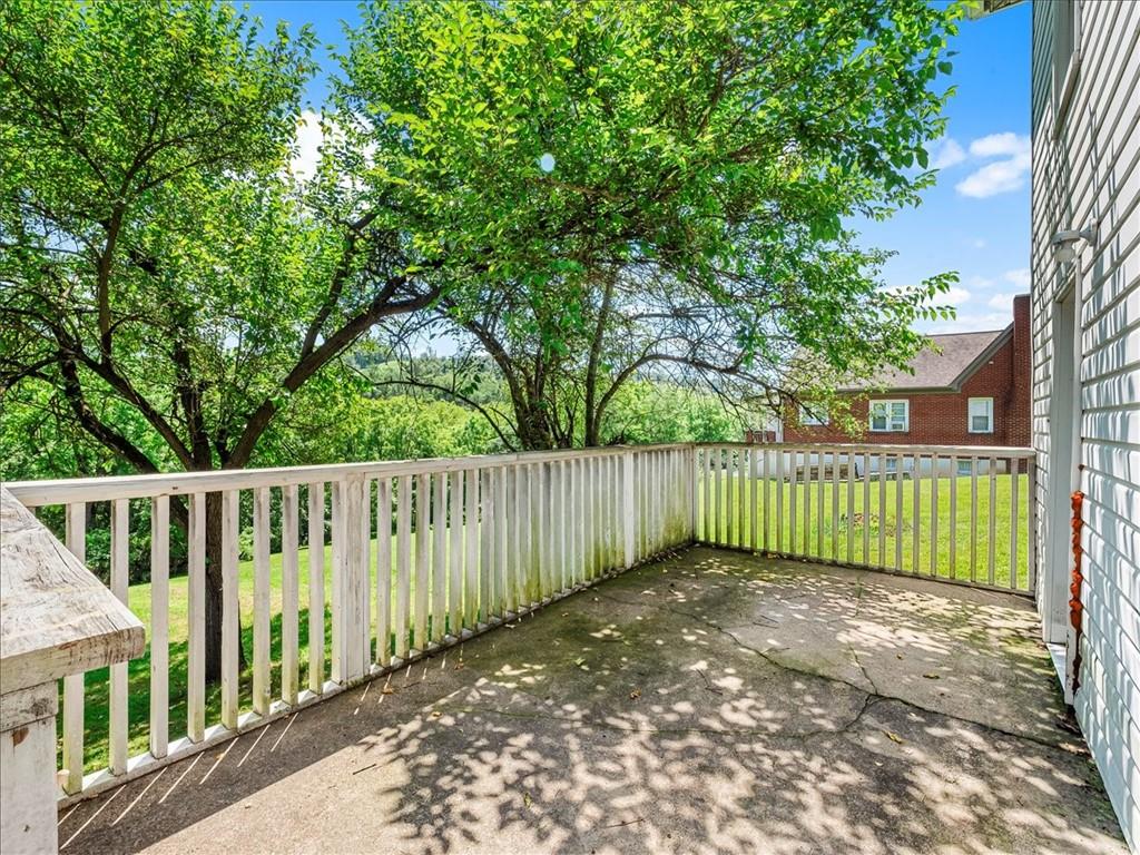 198 Penn Adamsburg Road Penn, PA 15675 - Photo 26 of 27 a view of a small yard with wooden fence