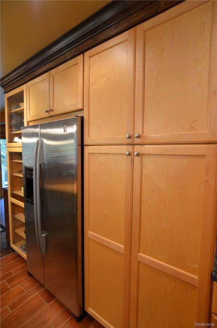 3800 Clyde Road Holly, MI 48442 - Photo 10 of 30 WALL OF STAINLESS AND STORAGE