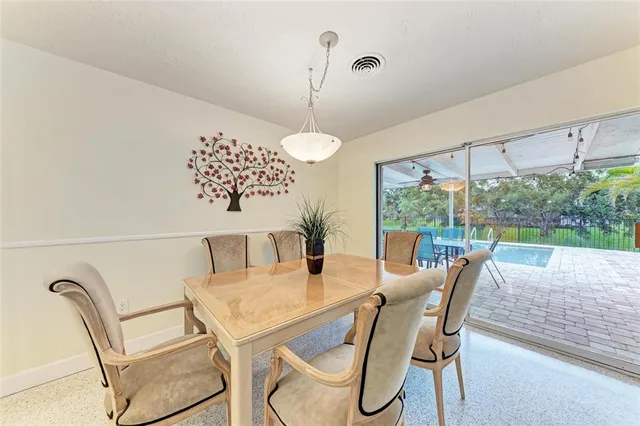 a bedroom with a bed couch and window