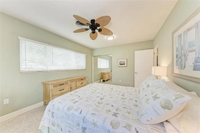 a bedroom with a bed and a closet