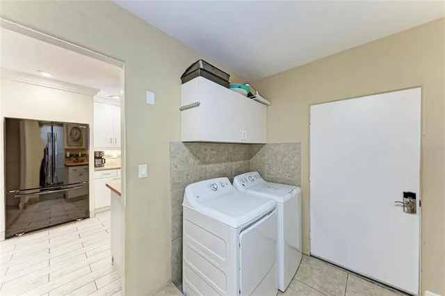 a view of swimming pool with a patio