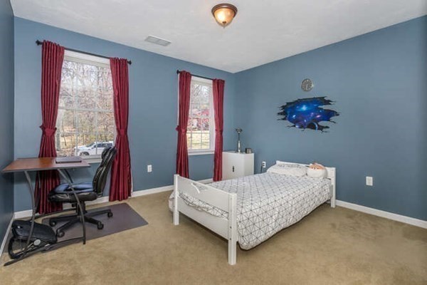 226 Daniels Street Franklin, MA 02038 - Photo 15 of 24 a bedroom with bed and a window