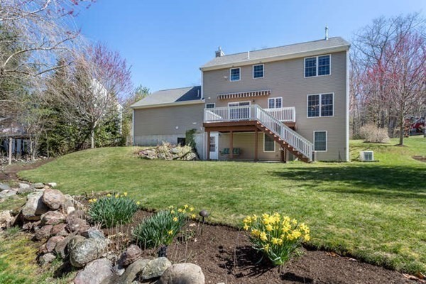 226 Daniels Street Franklin, MA 02038 - Photo 23 of 24 a front view of house with yard and green space