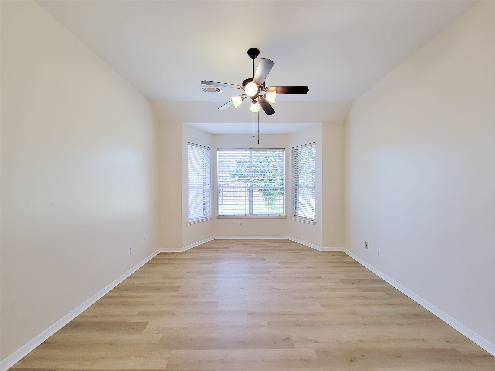 17314 Winfield Square Richmond, TX 77407 - Photo 29 of 47 a view of an empty room with a window