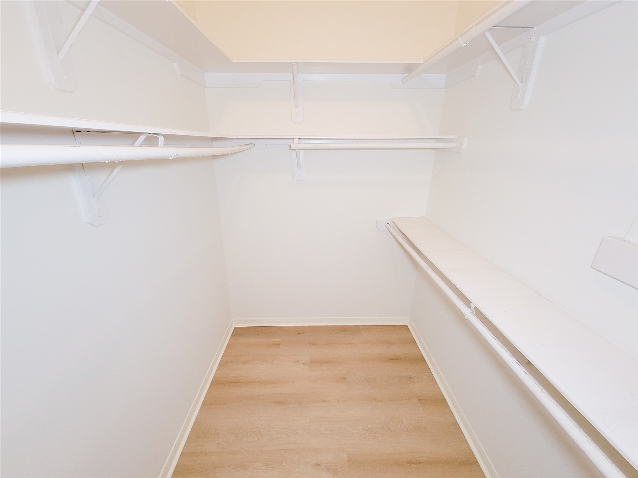 17314 Winfield Square Richmond, TX 77407 - Photo 33 of 47 a view of a room with racks on the wall