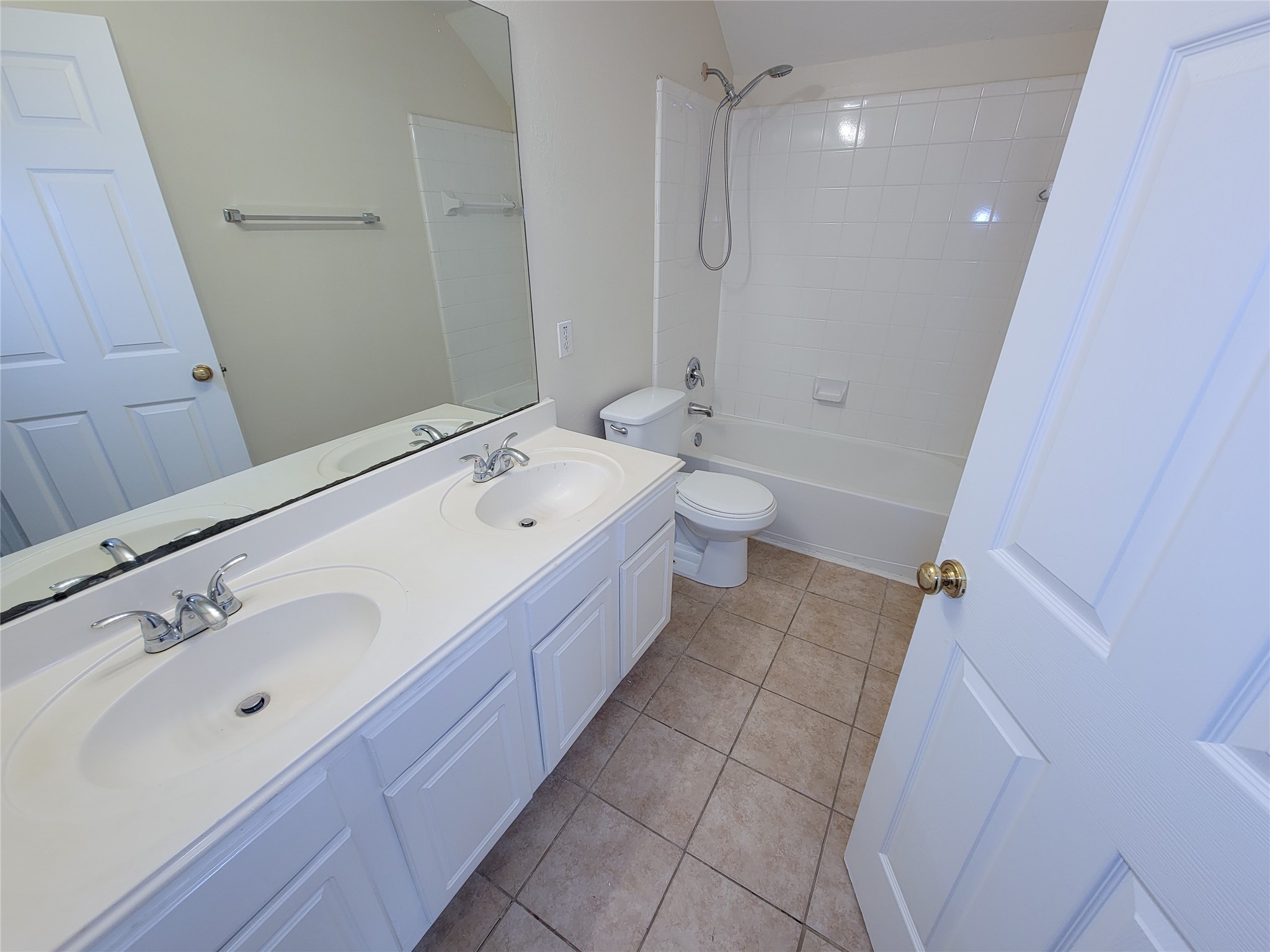 17314 Winfield Square Richmond, TX 77407 - Photo 38 of 47 a spacious bathroom with a tub sink toilet and a mirror