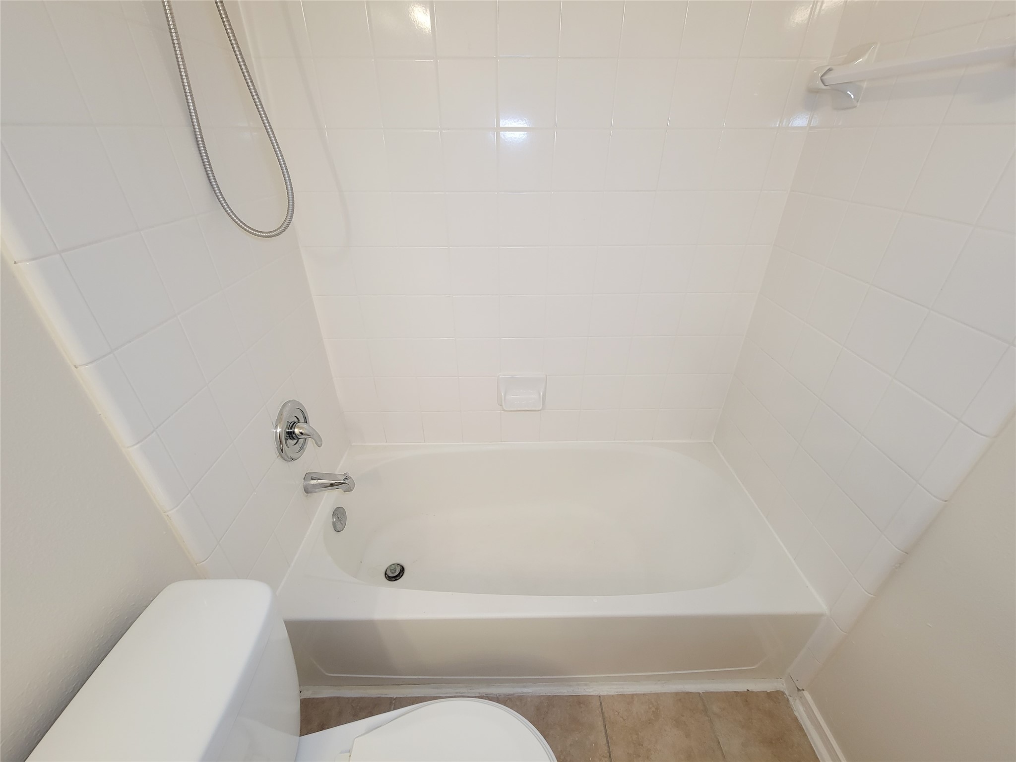 17314 Winfield Square Richmond, TX 77407 - Photo 40 of 47 a bathroom with a toilet and a shower