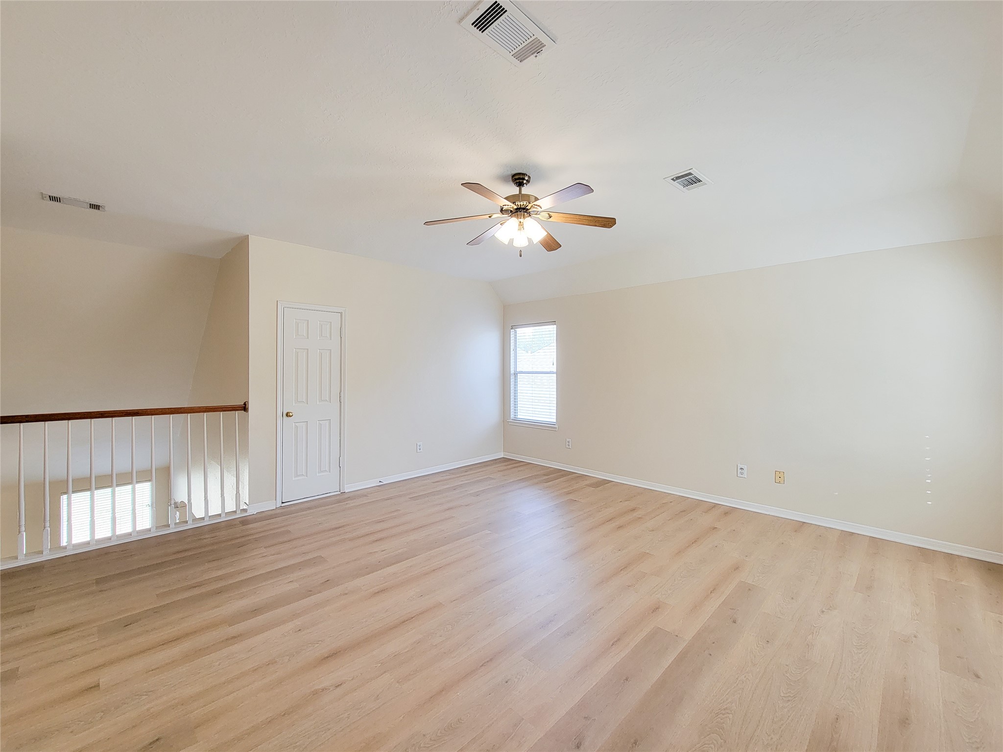 17314 Winfield Square Richmond, TX 77407 - Photo 42 of 47 wooden floor in an empty room with a window