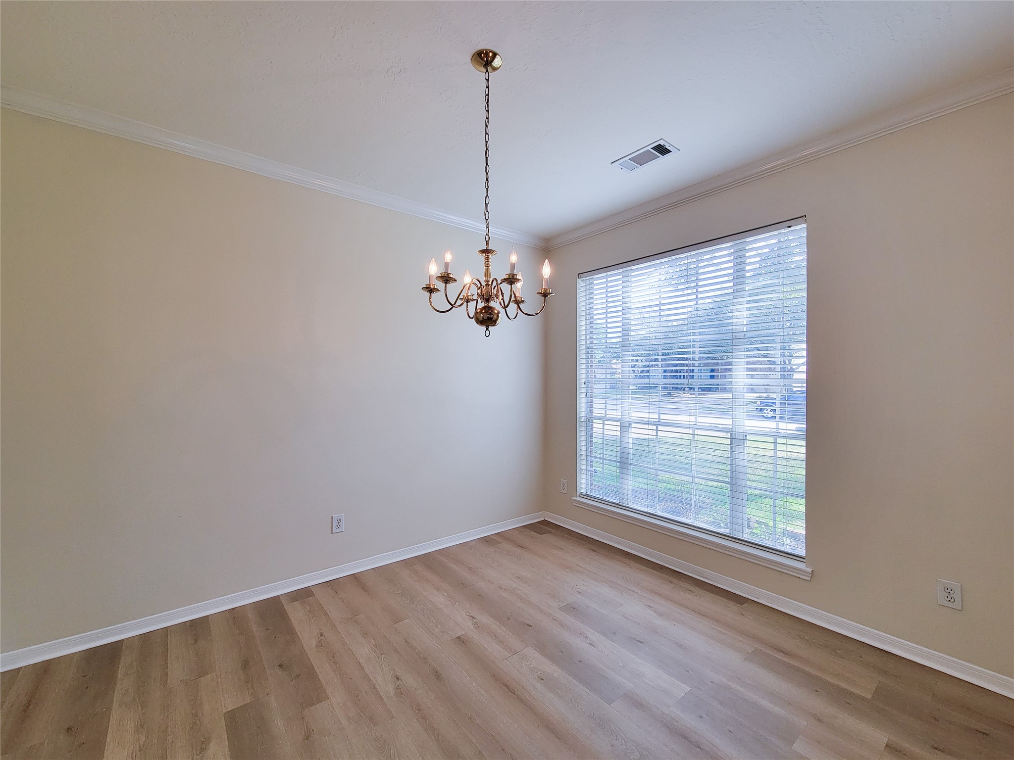 17314 Winfield Square Richmond, TX 77407 - Photo 10 of 47 a view of a room with window wooden floor and ceiling fan
