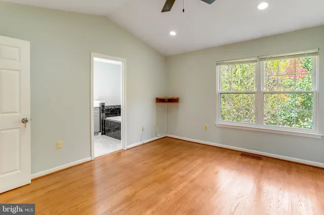 a view of a livingroom with a dishwasher and a window