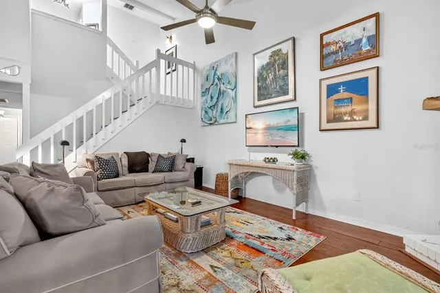 a living room with furniture and a rug