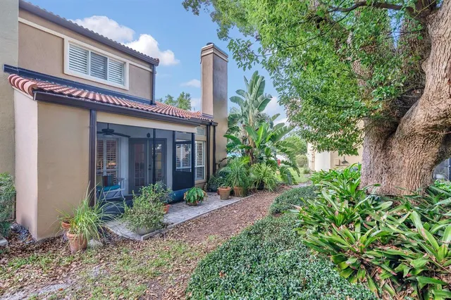 a view of a house with a garden