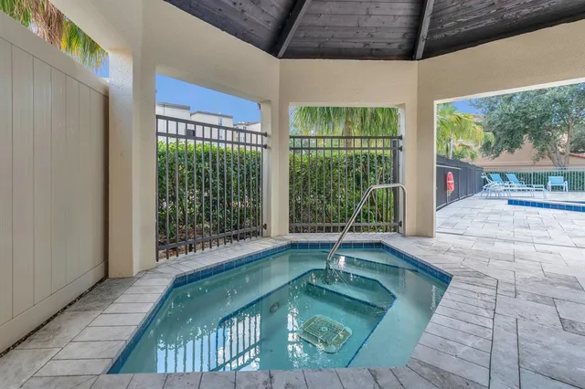 a view of swimming pool from a balcony
